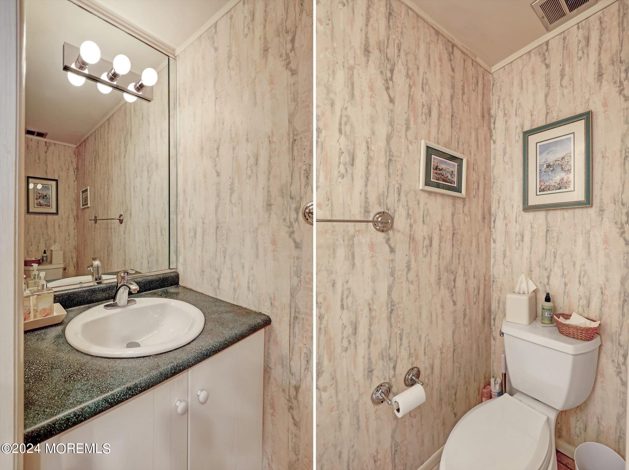 31 Shady Lane Freehold, NJ 07728 - Photo 14 of 40 a bathroom with a granite countertop sink toilet and shower