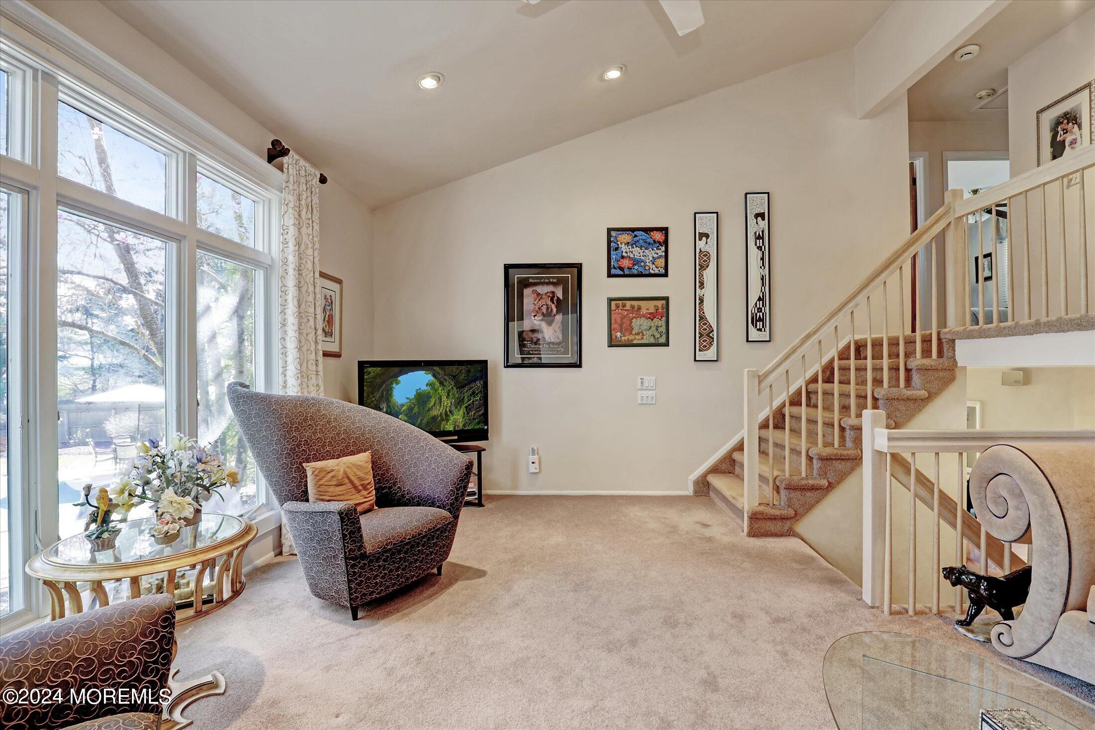 31 Shady Lane Freehold, NJ 07728 - Photo 15 of 40 a living room with furniture and a large window