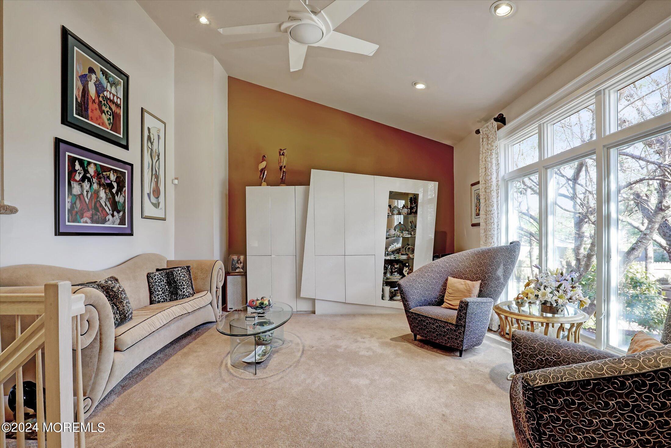 31 Shady Lane Freehold, NJ 07728 - Photo 16 of 40 a living room with furniture and a large window