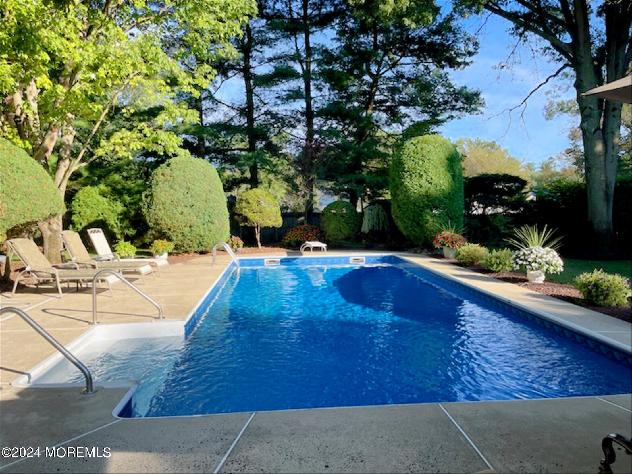 31 Shady Lane Freehold, NJ 07728 - Photo 29 of 40 a view of swimming pool with a patio