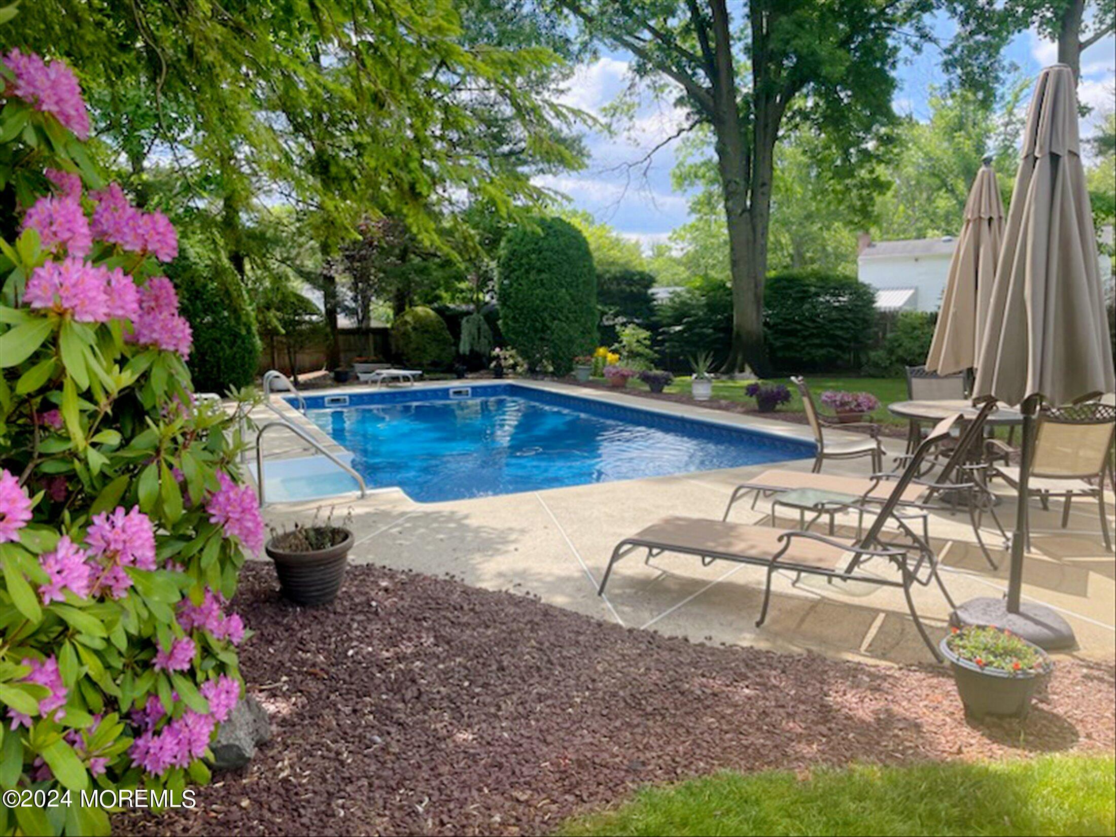 31 Shady Lane Freehold, NJ 07728 - Photo 31 of 40 a view of a backyard with sitting area