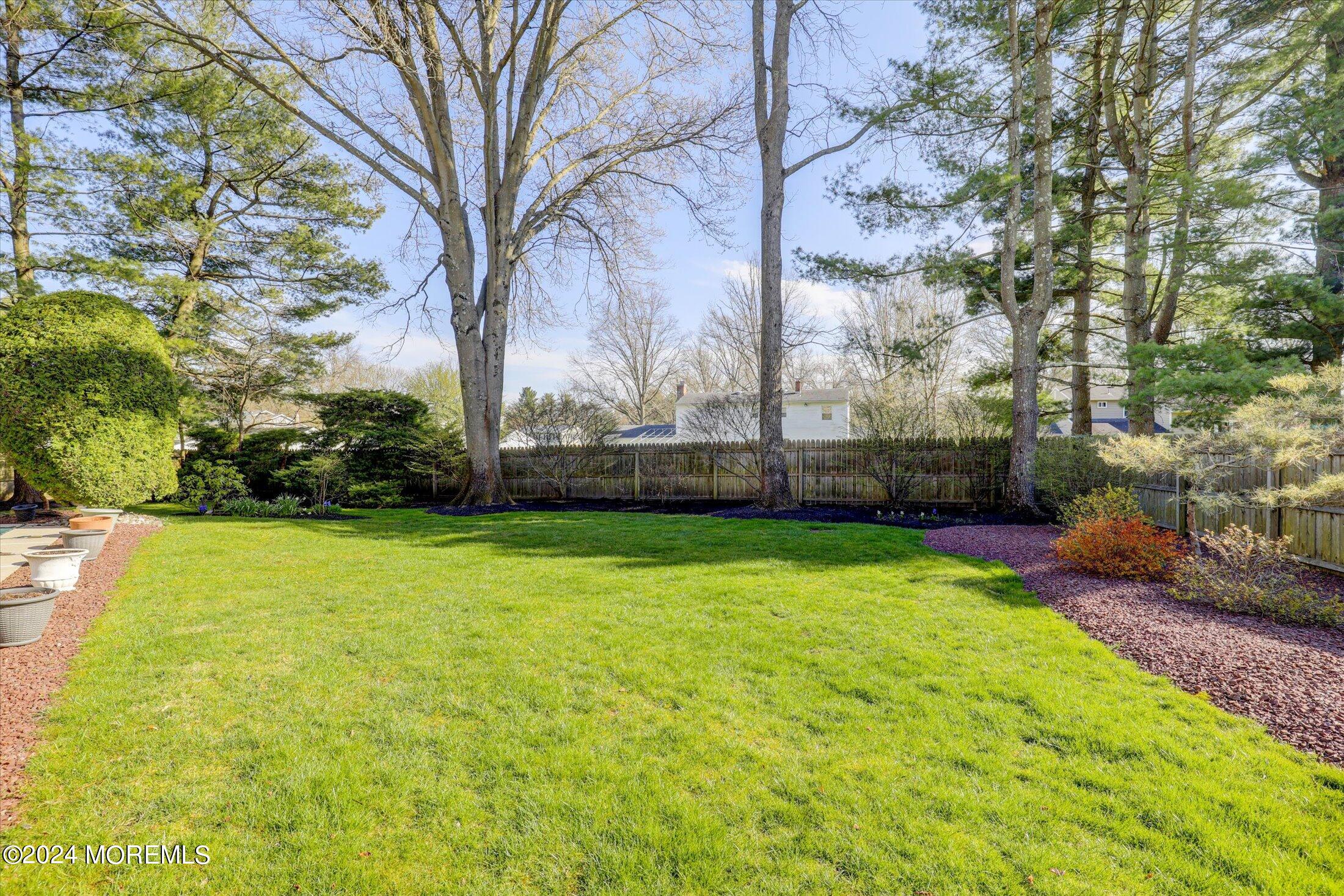 31 Shady Lane Freehold, NJ 07728 - Photo 36 of 40 a view of a yard with a trees
