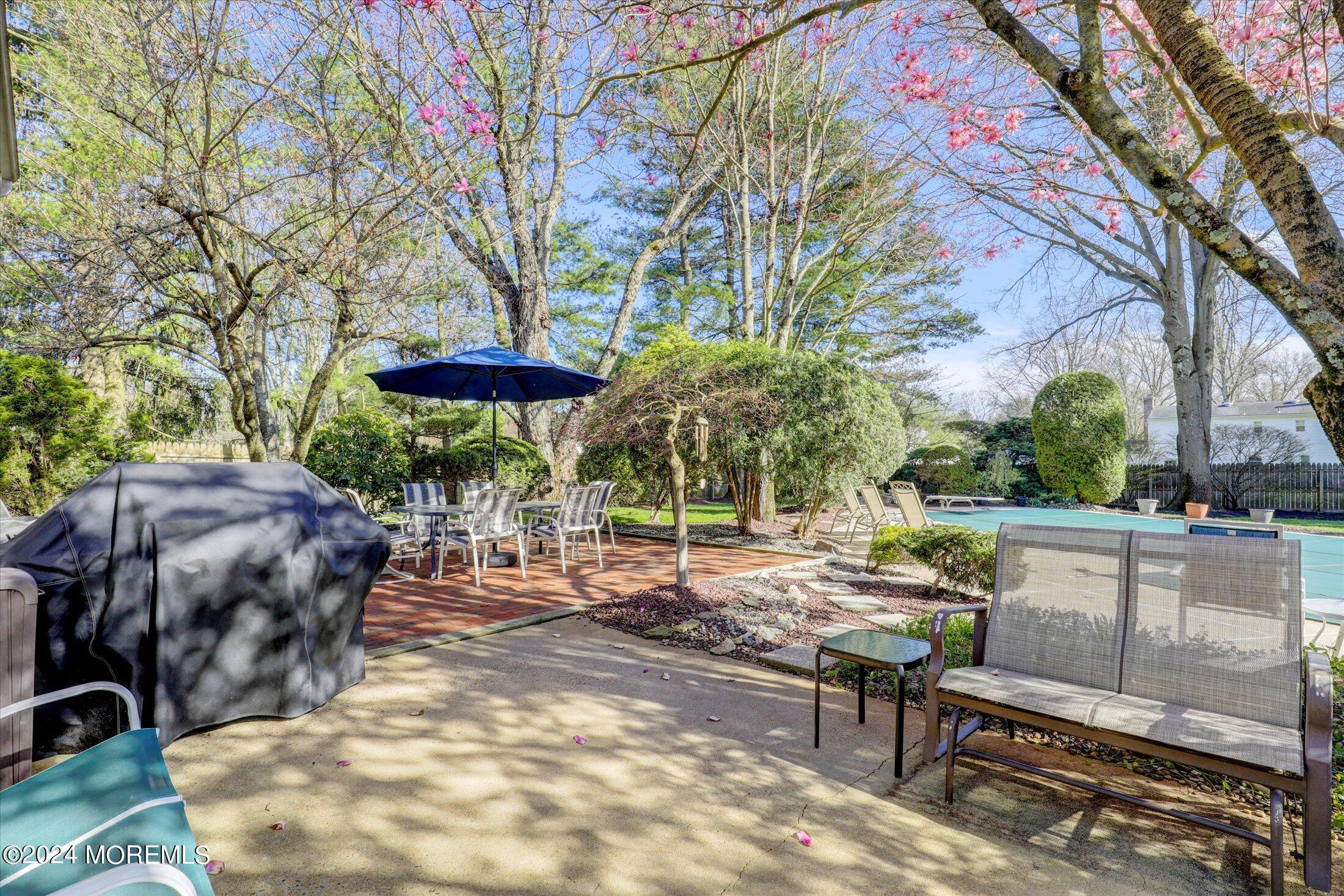 31 Shady Lane Freehold, NJ 07728 - Photo 40 of 40 a view of a backyard with sitting area