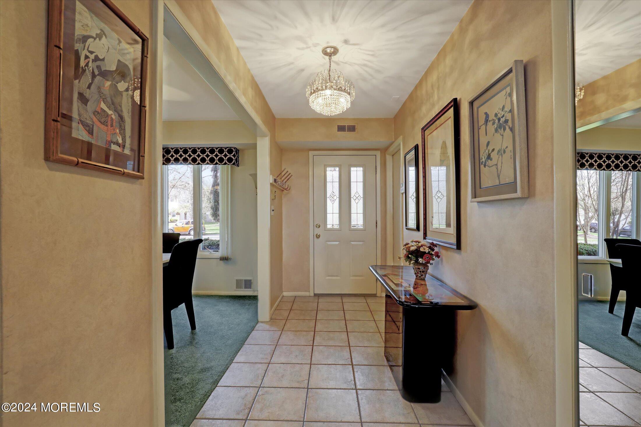31 Shady Lane Freehold, NJ 07728 - Photo 4 of 40 a bathroom with a sink and a mirror