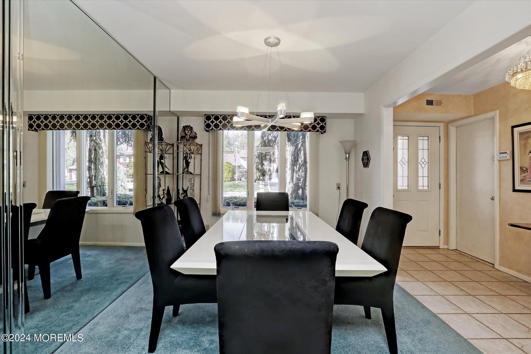 31 Shady Lane Freehold, NJ 07728 - Photo 7 of 40 a view of a livingroom with furniture and window