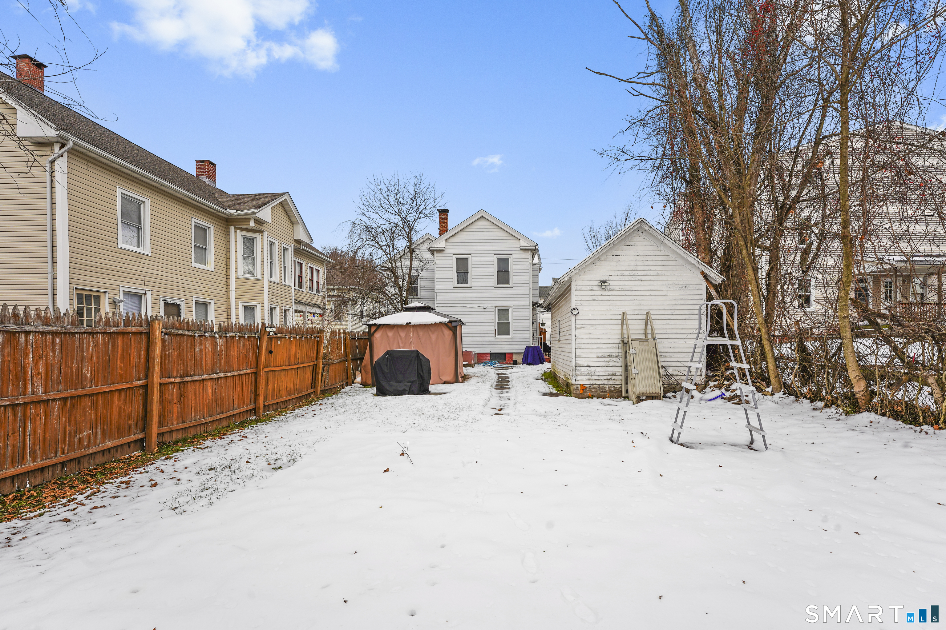 17 Windsor Street Enfield, CT 06082 - Photo 21 of 21 a view of a house with a yard