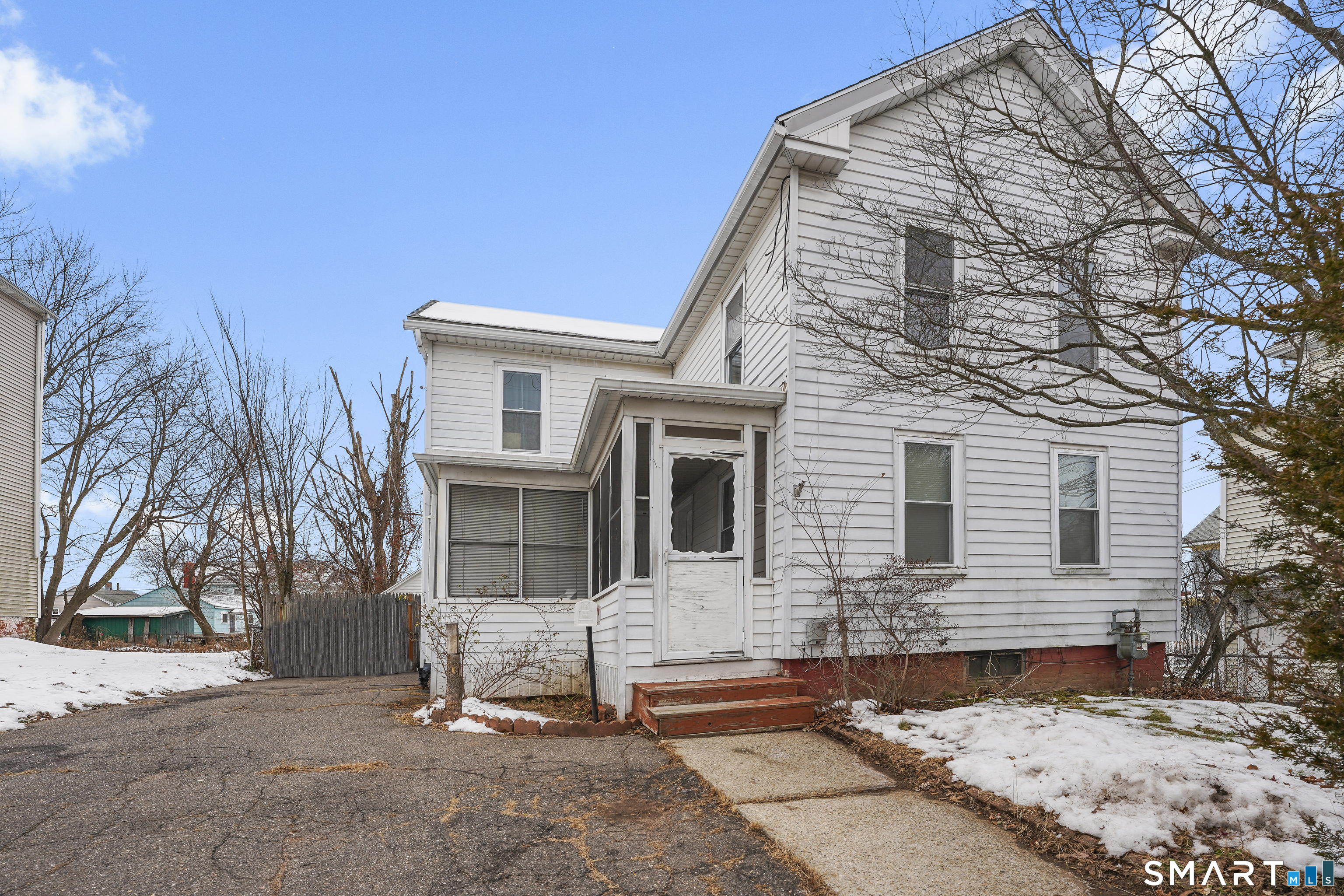 17 Windsor Street Enfield, CT 06082 - Photo 8 of 21 front view of house with a yard