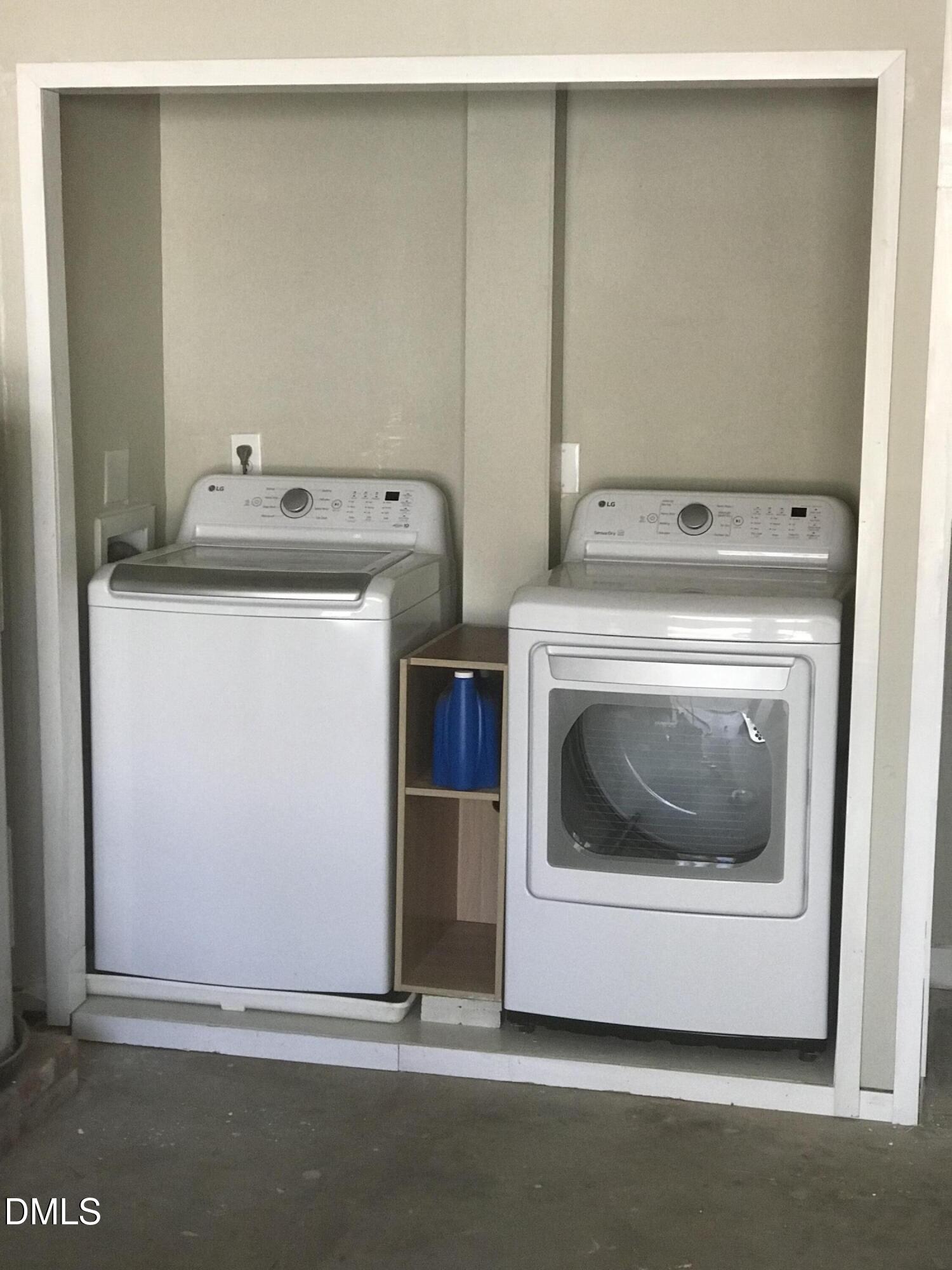 5002 Wickham Road Raleigh, NC 27606 - Photo 29 of 36 a utility room with dryer and washer