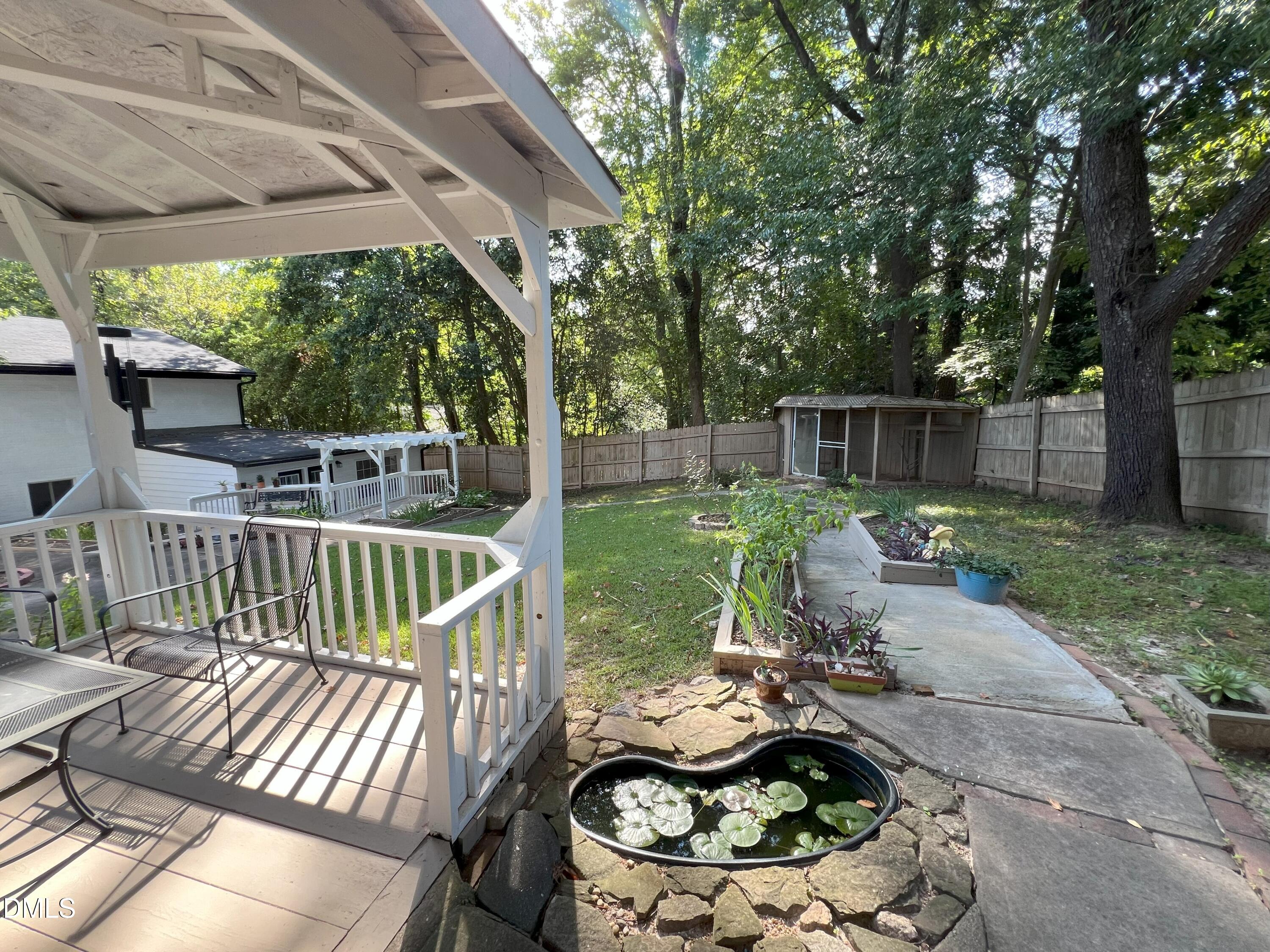 5002 Wickham Road Raleigh, NC 27606 - Photo 33 of 36 a view of yard from deck having patio