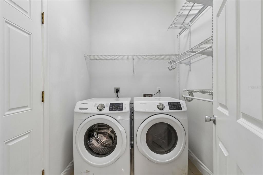 2311 West Aileen Street Tampa, FL 33607 - Photo 11 of 38 a utility room with dryer and washer