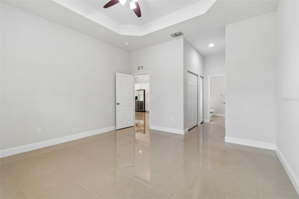 2311 West Aileen Street Tampa, FL 33607 - Photo 23 of 38 wooden floor in an empty room with a window