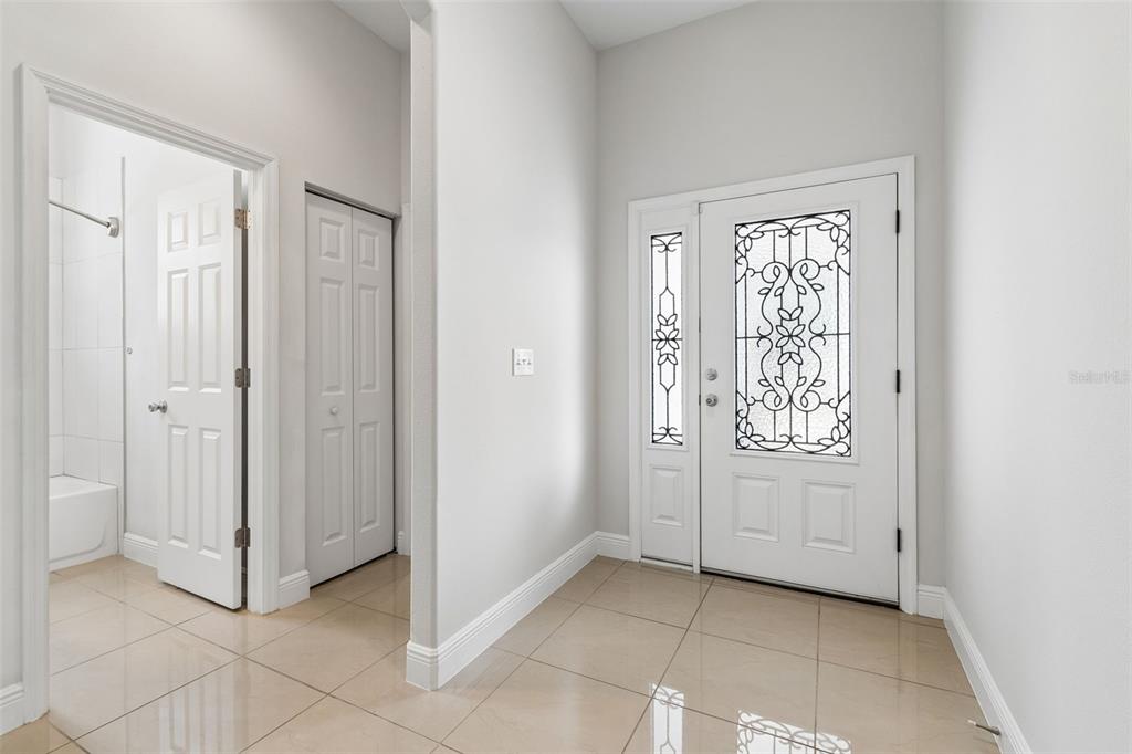2311 West Aileen Street Tampa, FL 33607 - Photo 4 of 38 an empty room with windows