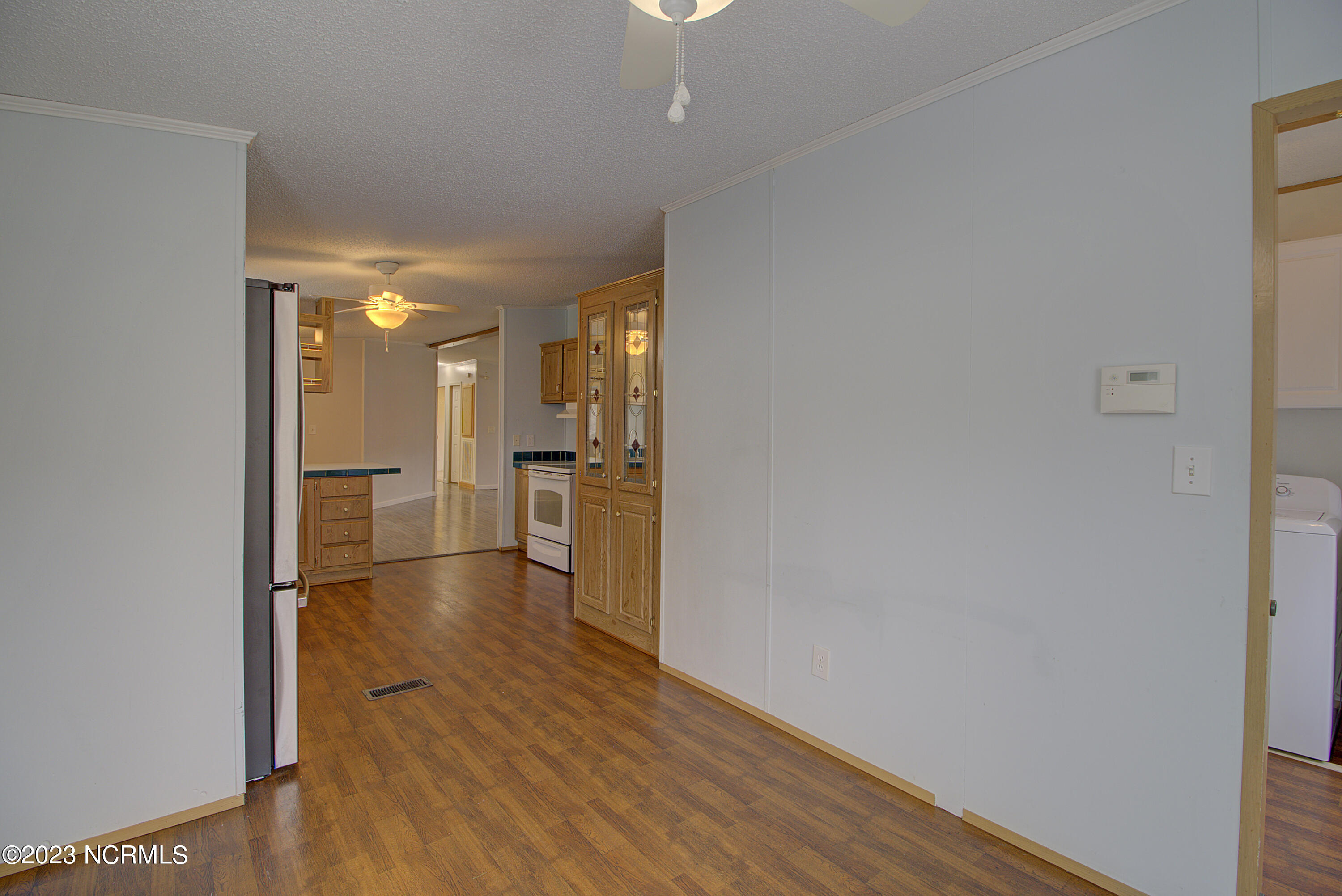 531 Greenacres Drive Hampstead, NC 28443 - Photo 12 of 45 Dining to Kitchen