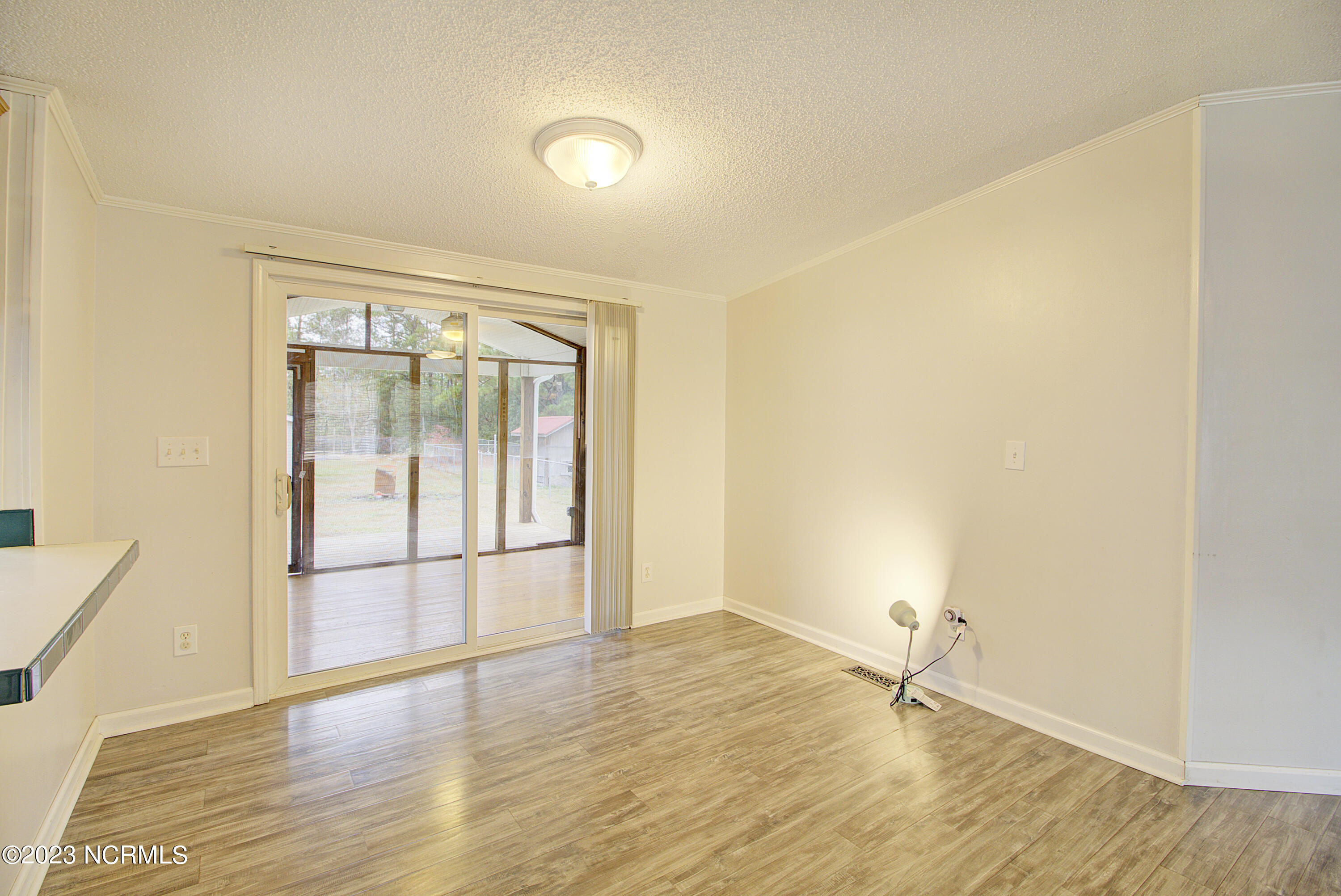 531 Greenacres Drive Hampstead, NC 28443 - Photo 25 of 45 living to porch