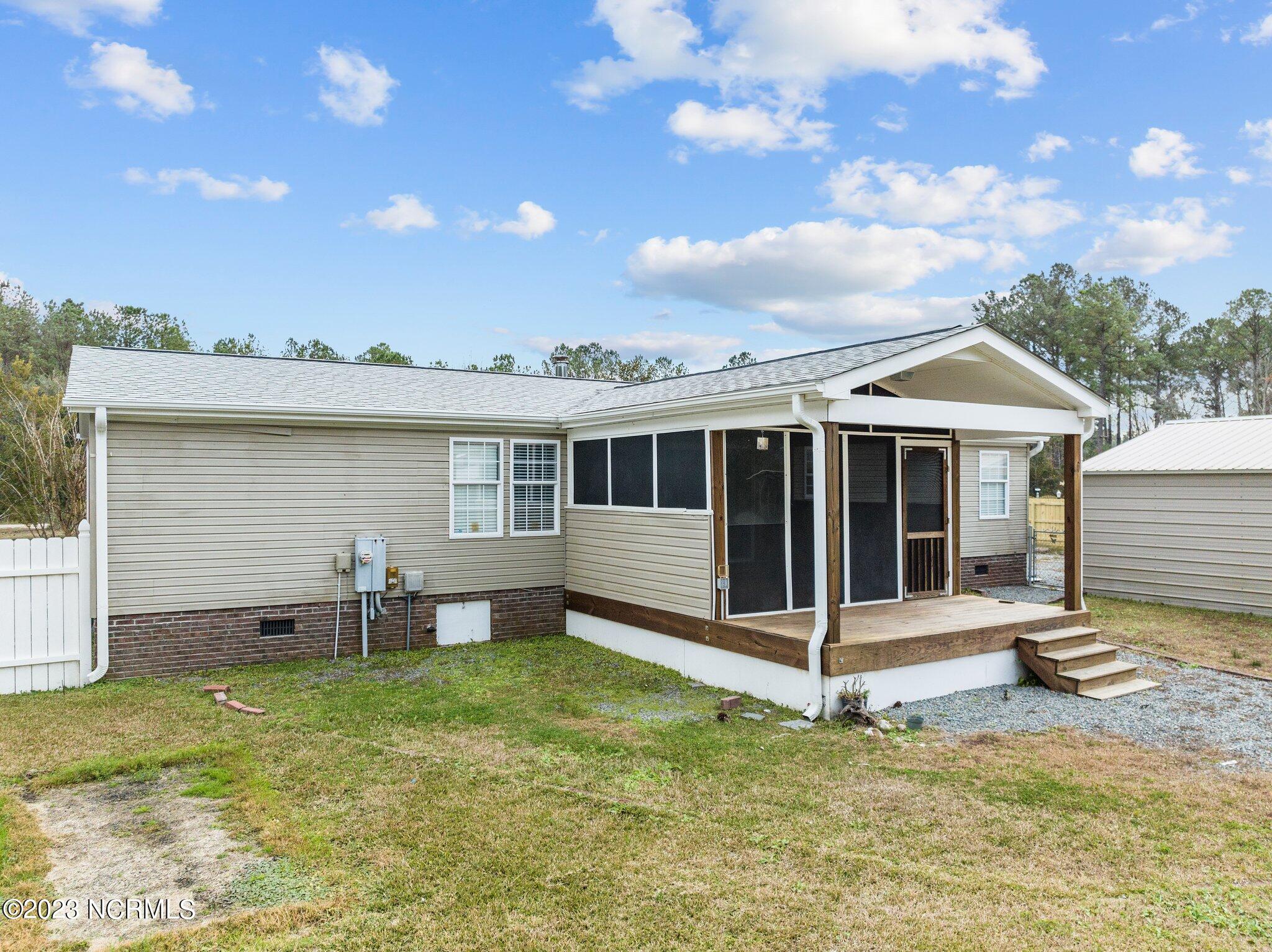 531 Greenacres Drive Hampstead, NC 28443 - Photo 29 of 45 Back porch