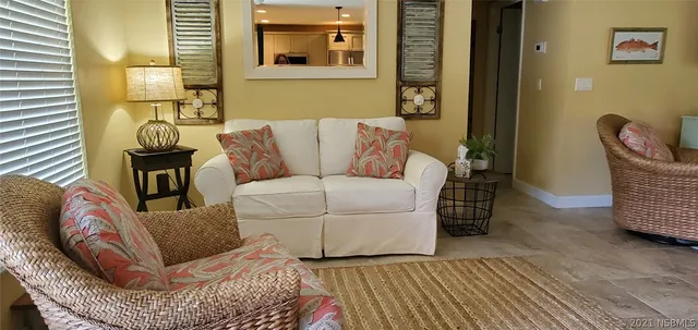 a kitchen with stainless steel appliances a refrigerator and cabinets