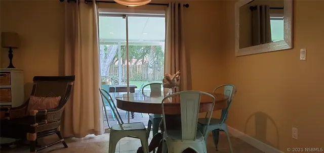 a kitchen with stainless steel appliances granite countertop a stove top oven a sink and a refrigerator