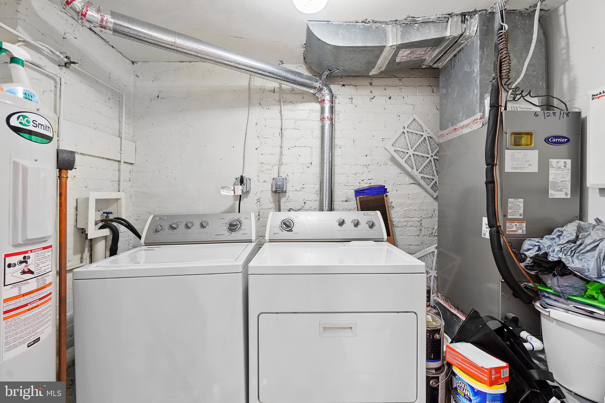 936 T Street Northwest, Unit B Washington, DC 20001 - Photo 17 of 19 a utility room with dryer and washer