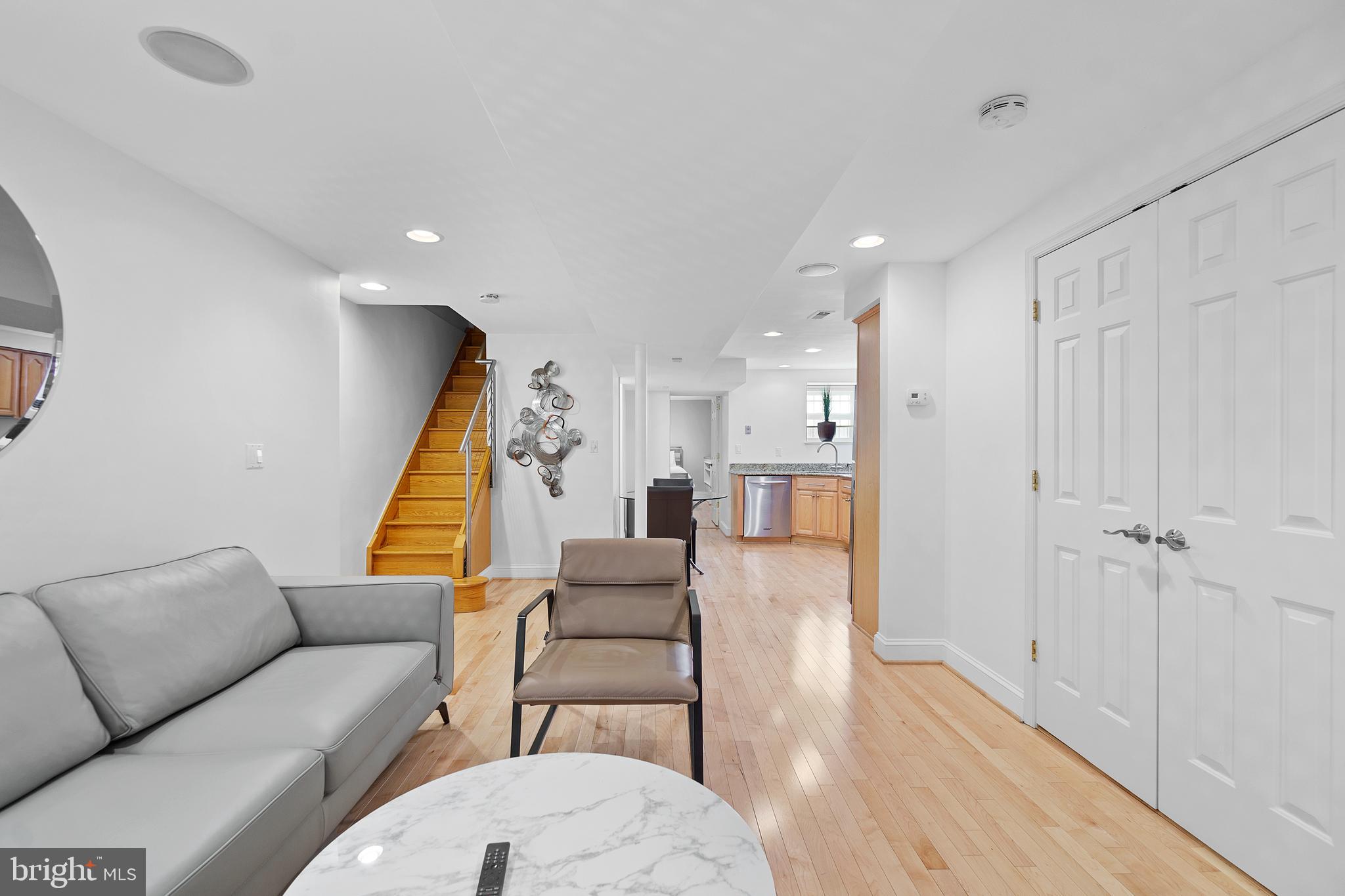 936 T Street Northwest, Unit B Washington, DC 20001 - Photo 4 of 19 a living room with furniture and a wooden floor