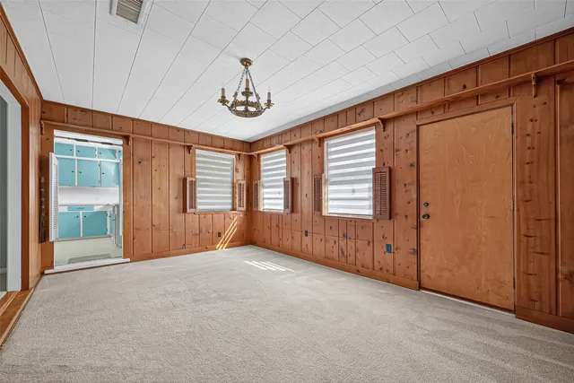 a kitchen with a sink stove and refrigerator
