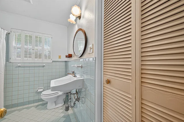 a view of a backyard with sitting area