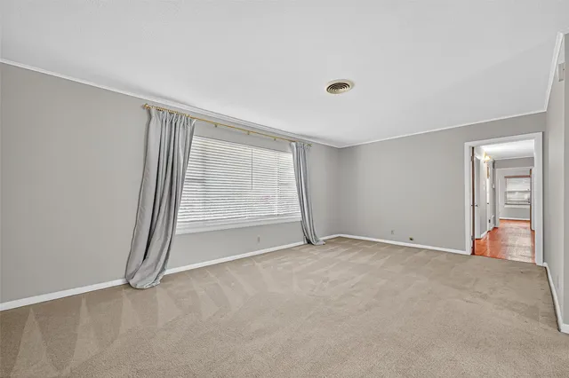 an empty room with an entryway