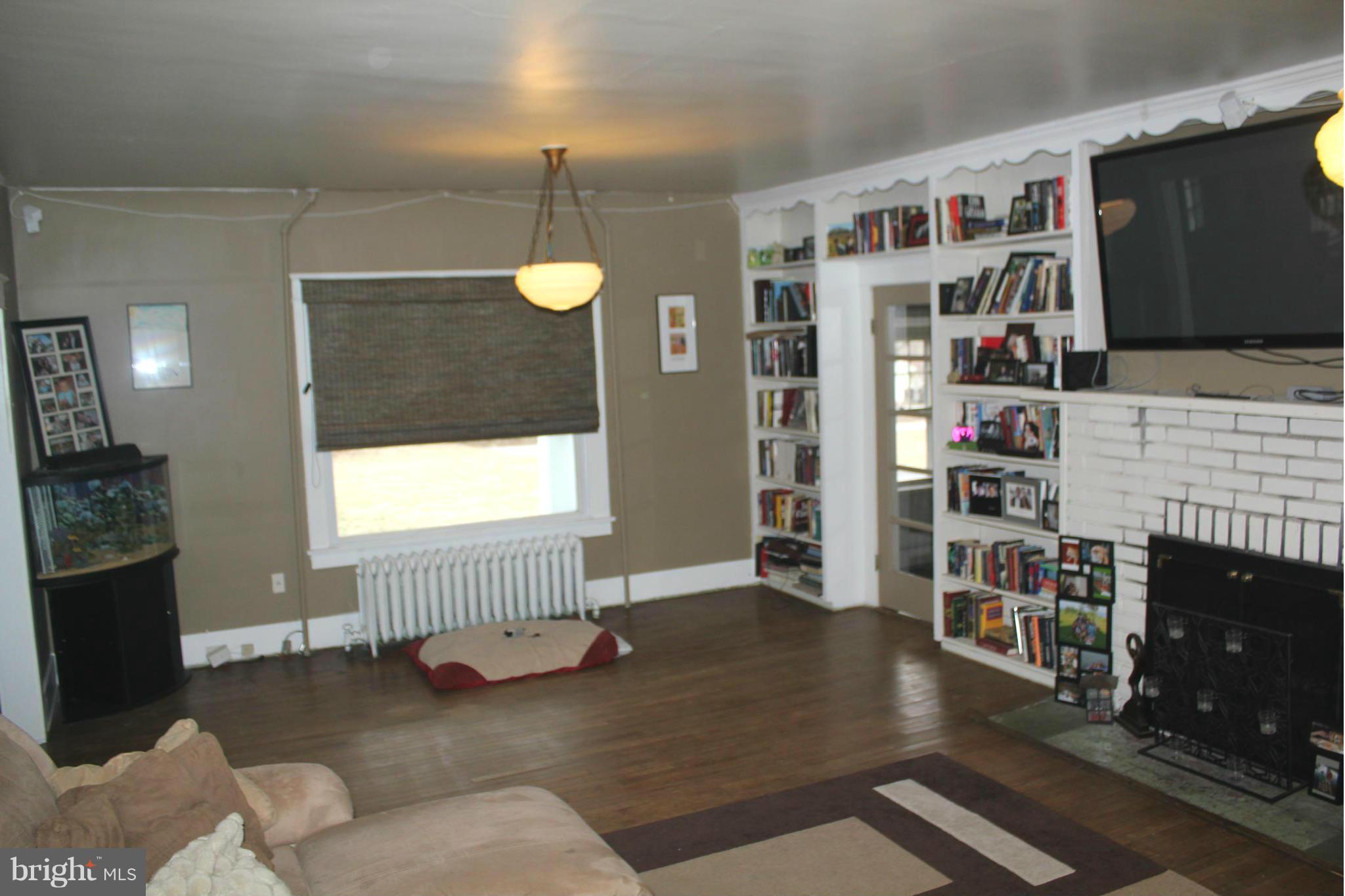 1384 Fairfield Loop Road Crownsville, MD 21032 - Photo 8 of 30 Living Room in Main House w/Hardwoods & Built-ins