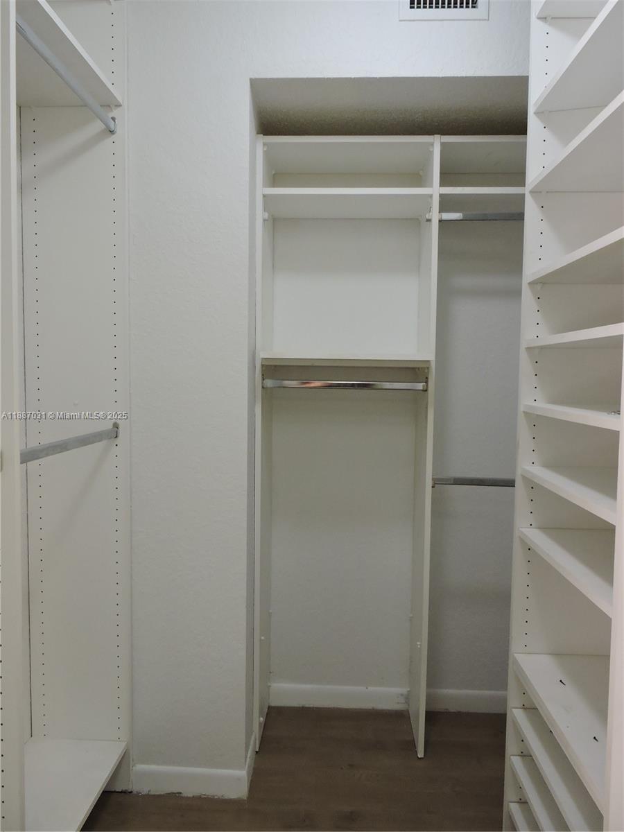 1316 Southwest 118th Terrace, Unit 1316 Davie, FL 33325 - Photo 30 of 44 a view of an empty walk in closet