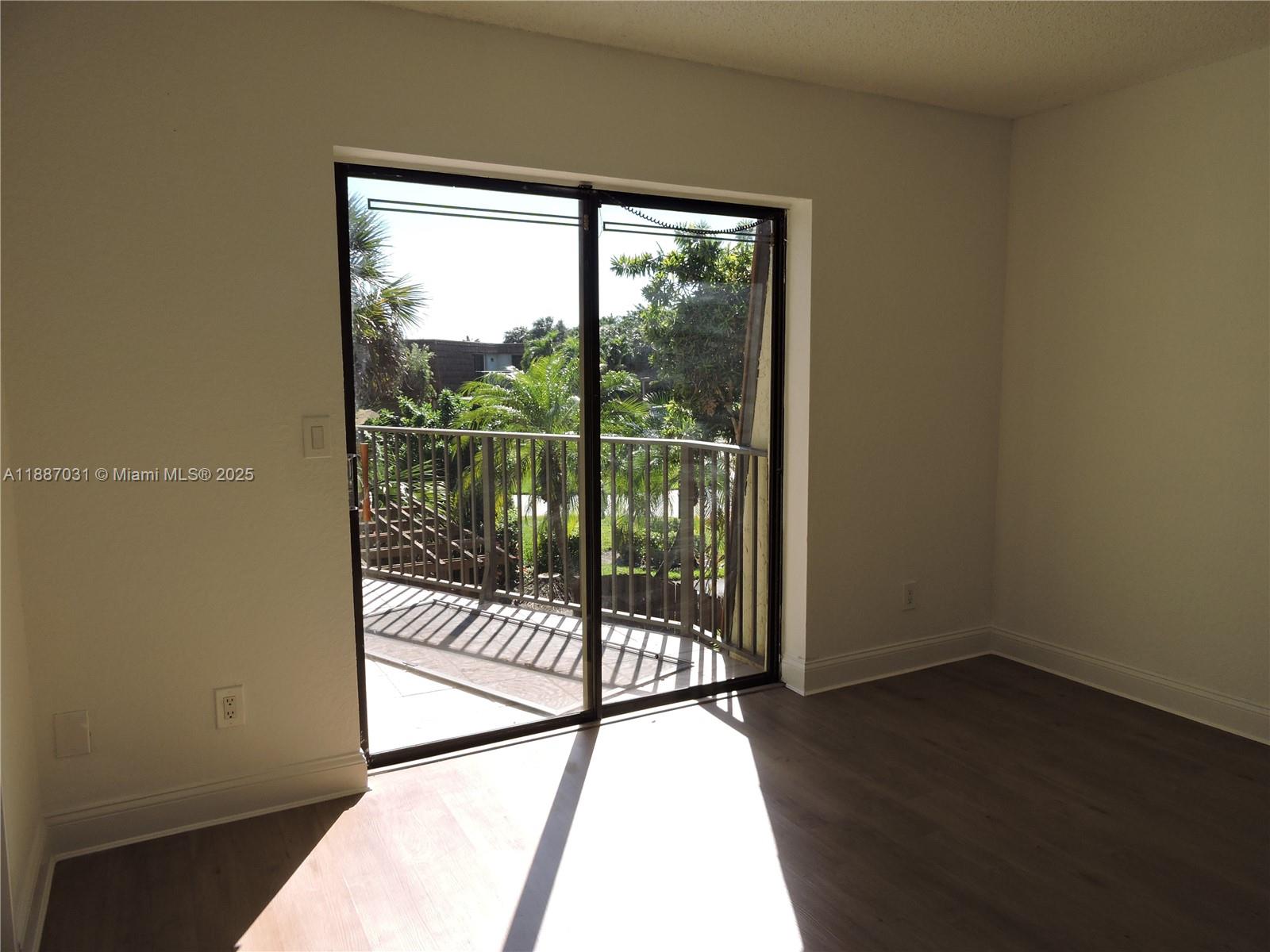 1316 Southwest 118th Terrace, Unit 1316 Davie, FL 33325 - Photo 37 of 44 a view of a balcony from a room