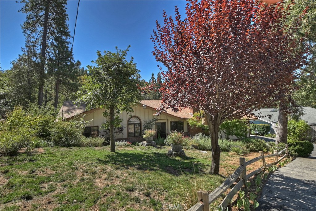 23167 Brookside Road Crestline, CA 92325 - Photo 12 of 49 a front view of a house with a yard