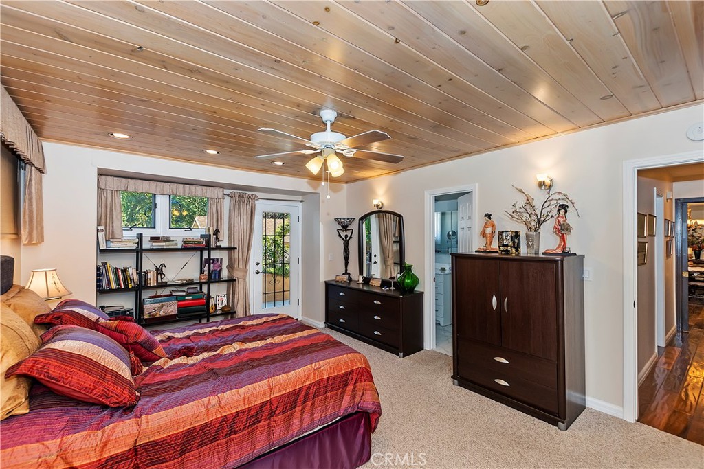 23167 Brookside Road Crestline, CA 92325 - Photo 29 of 49 a bedroom with a bed and a dresser