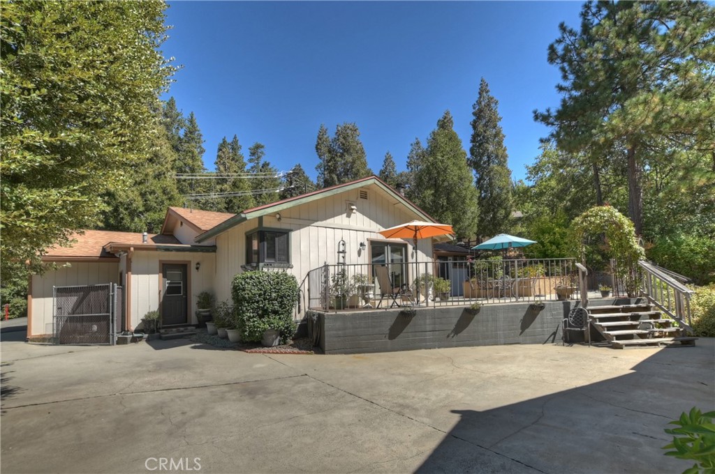 23167 Brookside Road Crestline, CA 92325 - Photo 42 of 49 front view of a house with a yard