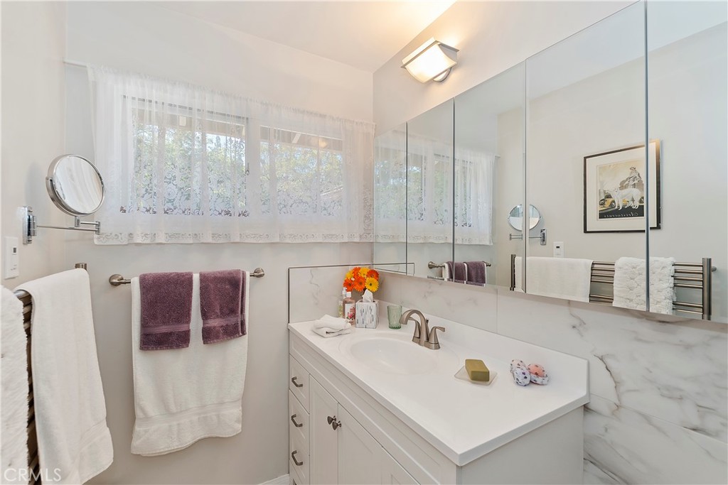 23167 Brookside Road Crestline, CA 92325 - Photo 48 of 49 a bathroom with a sink vanity and tub