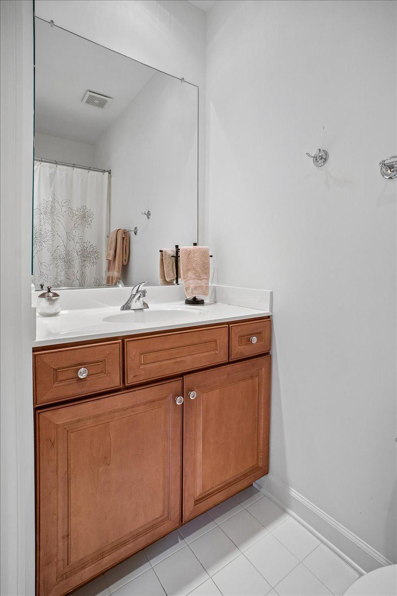 412 Pendleton Street Alexandria, VA 22314 - Photo 31 of 48 Charming bathroom with warm wood accents.