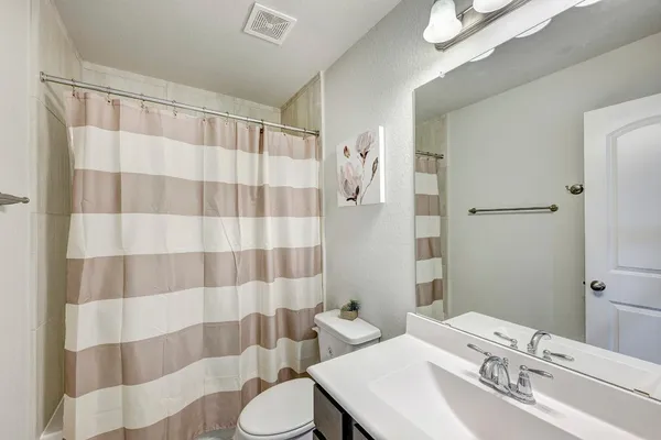 a view of entryway with stairs and wooden floor