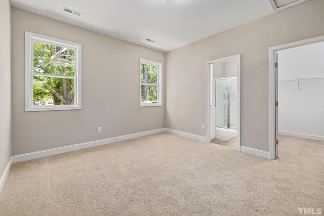 an empty room with windows