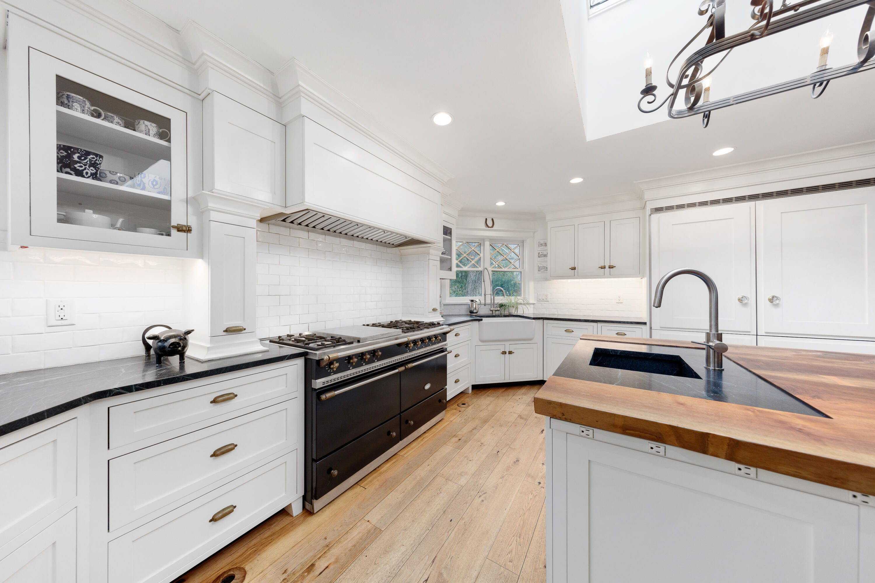 121 Middlesex Road Darien, CT 06820 - Photo 14 of 34 a kitchen with stainless steel appliances granite countertop a sink and cabinets