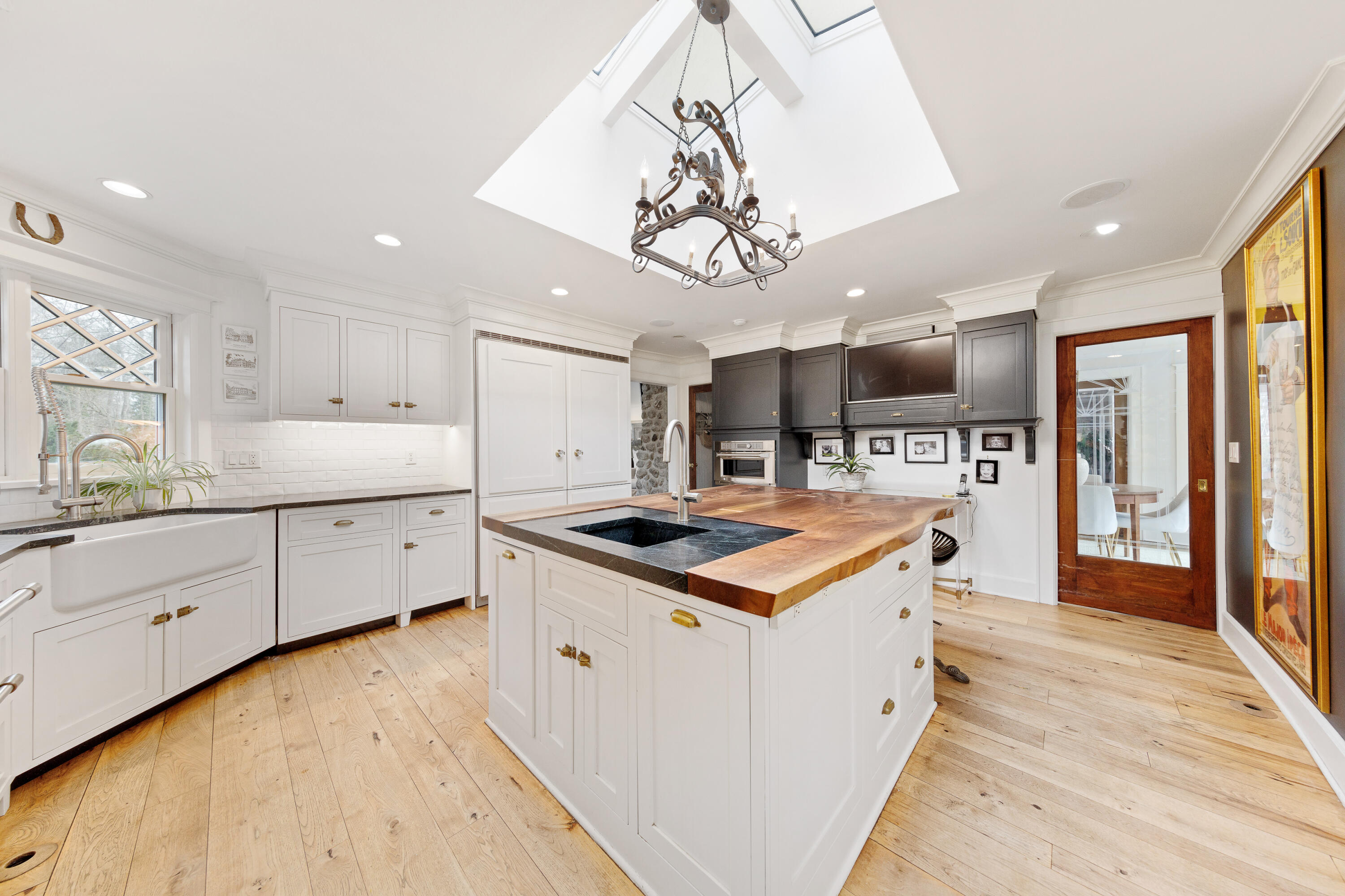 121 Middlesex Road Darien, CT 06820 - Photo 15 of 34 a kitchen with stainless steel appliances granite countertop a sink and a stove