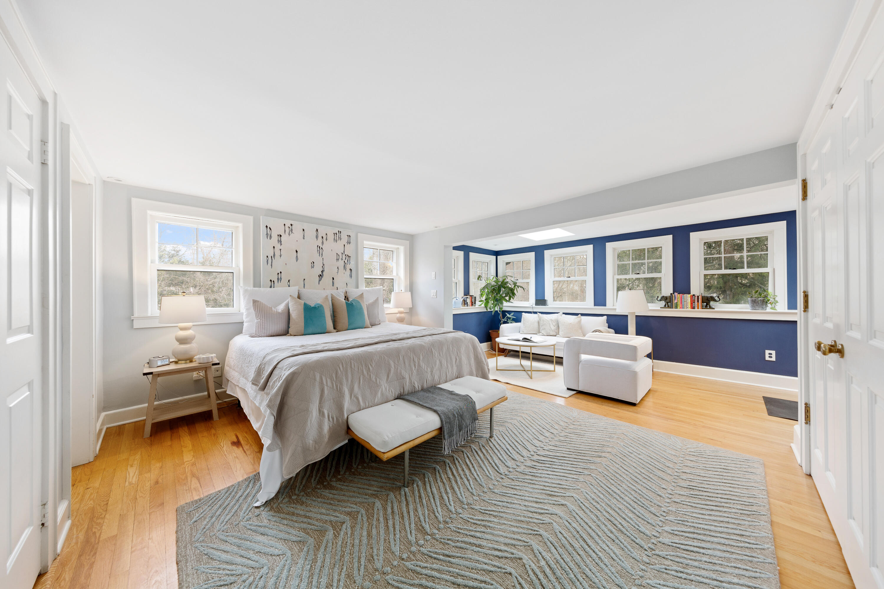 121 Middlesex Road Darien, CT 06820 - Photo 21 of 34 a bedroom with a bed and wooden floor