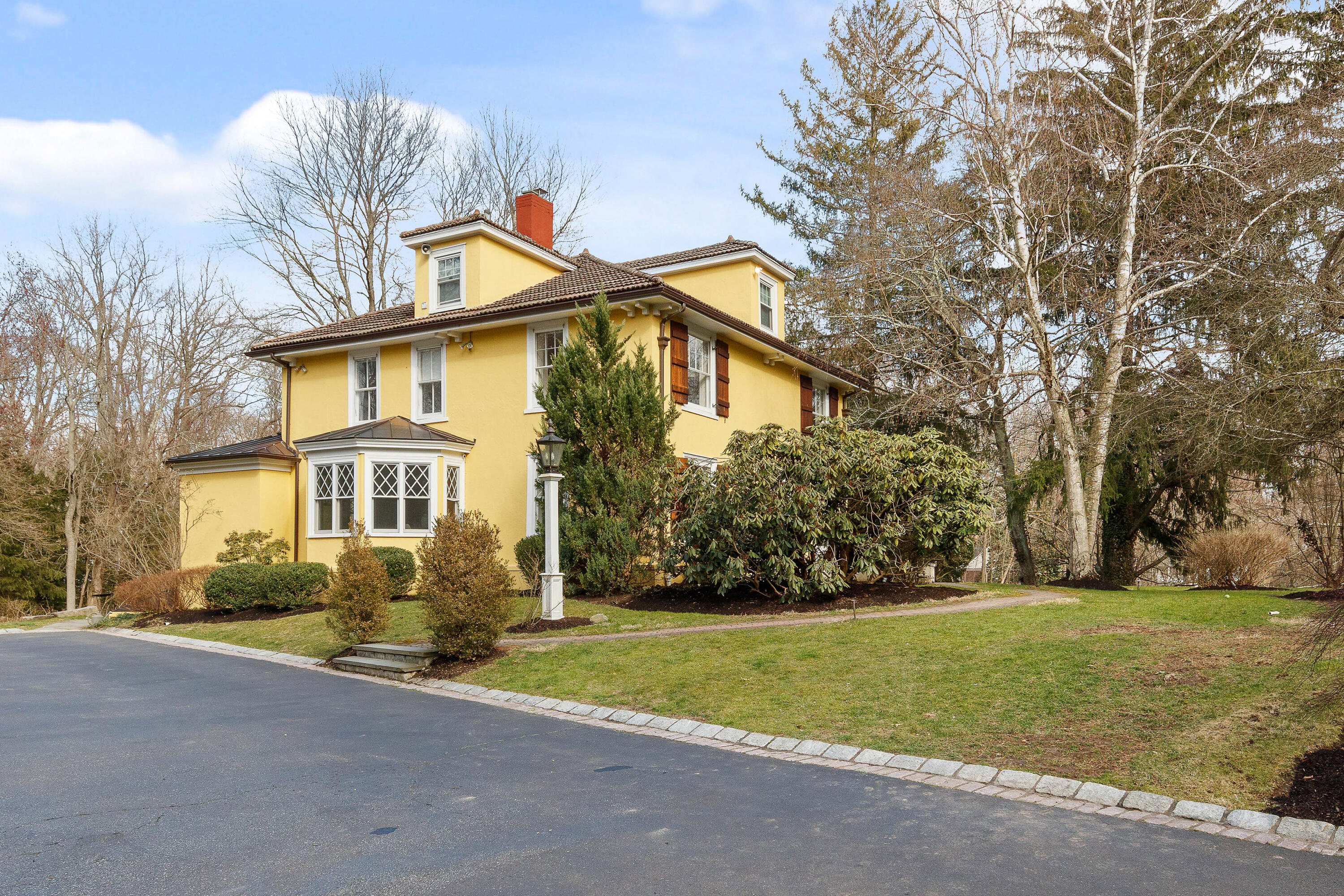 121 Middlesex Road Darien, CT 06820 - Photo 3 of 34 a front view of house with yard