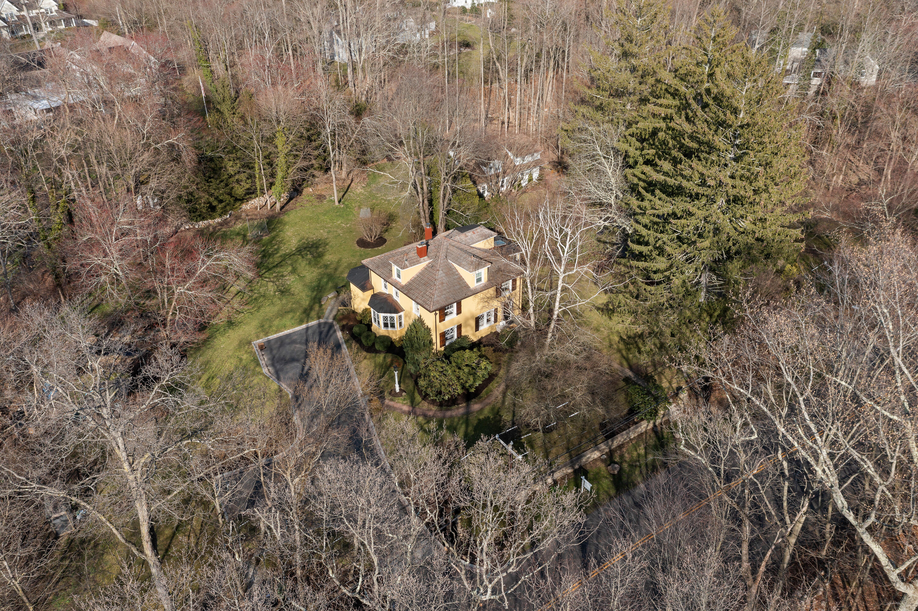 121 Middlesex Road Darien, CT 06820 - Photo 4 of 34 a aerial view of a house with a yard