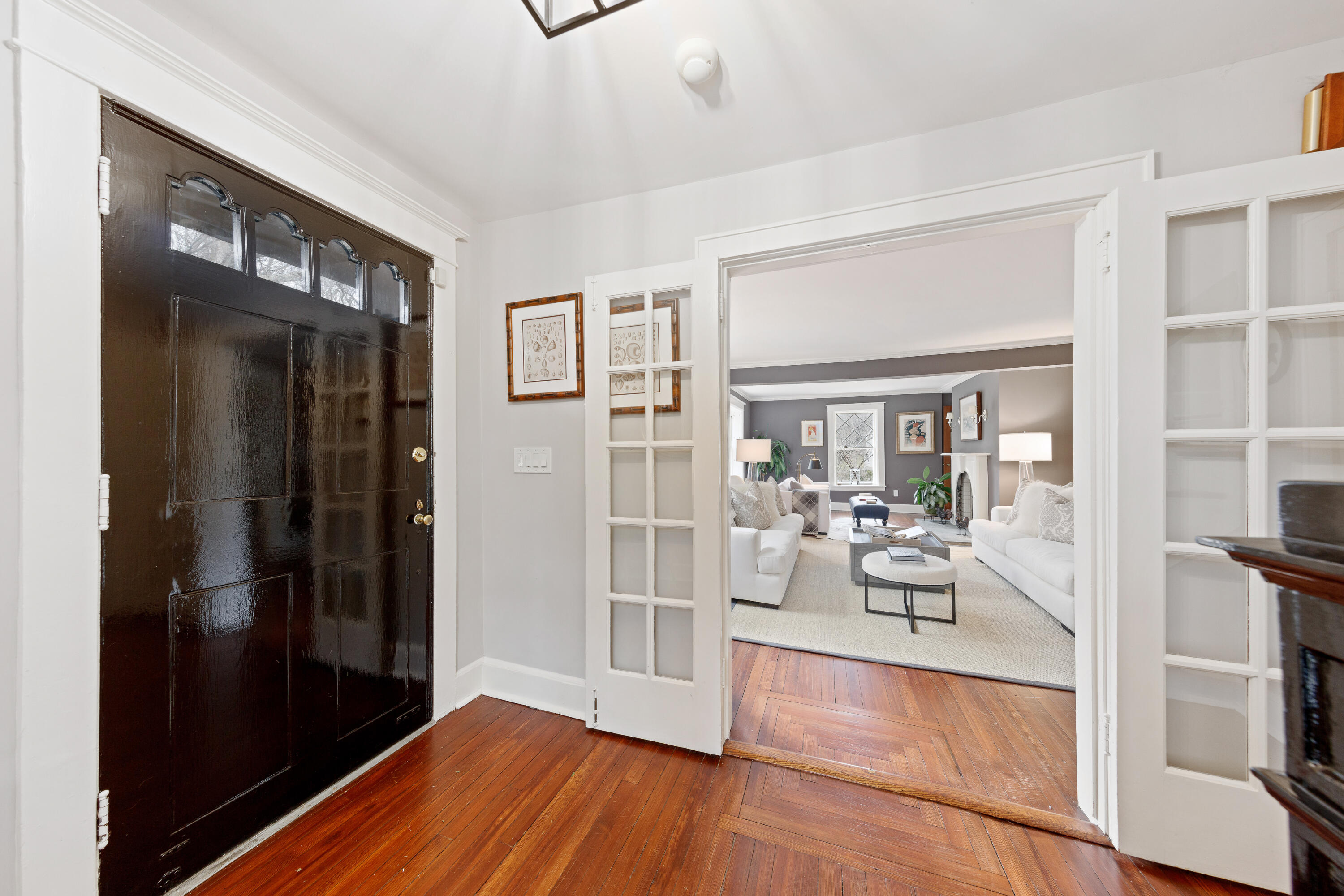 121 Middlesex Road Darien, CT 06820 - Photo 5 of 34 a living room with furniture and a floor to ceiling window