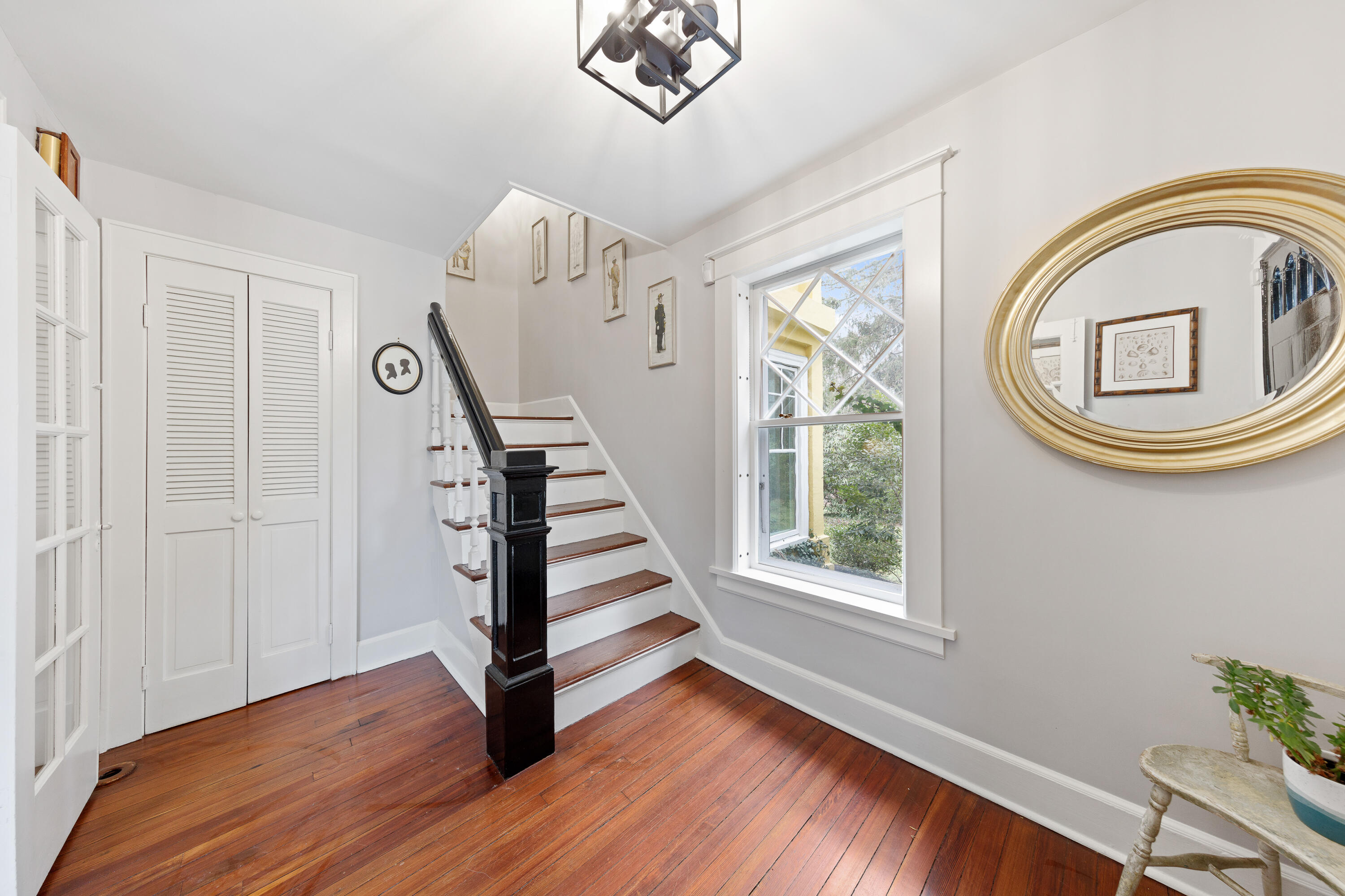121 Middlesex Road Darien, CT 06820 - Photo 6 of 34 a view of an entryway with wooden floor and a window