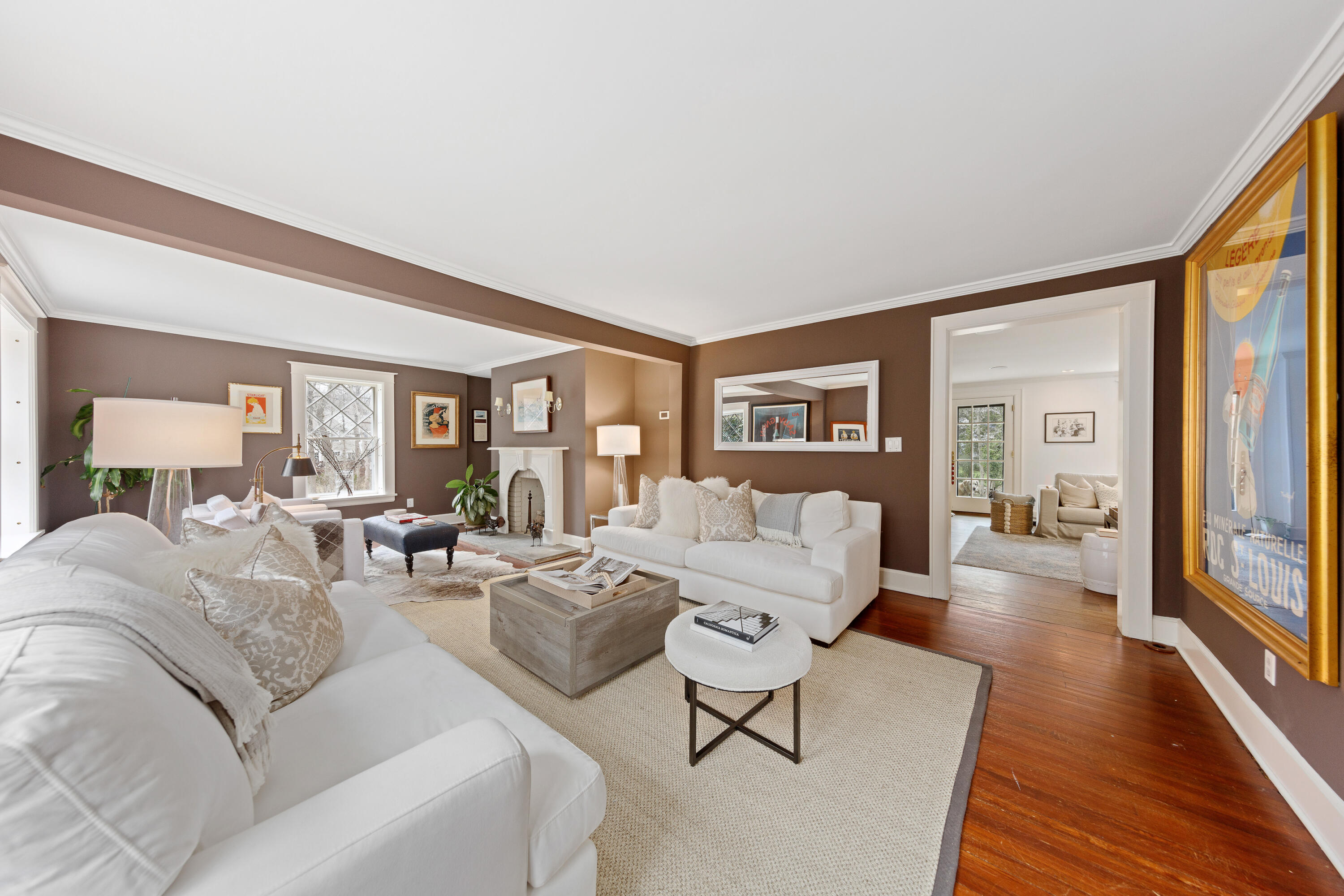 121 Middlesex Road Darien, CT 06820 - Photo 9 of 34 a living room with furniture large wooden floor and a large window