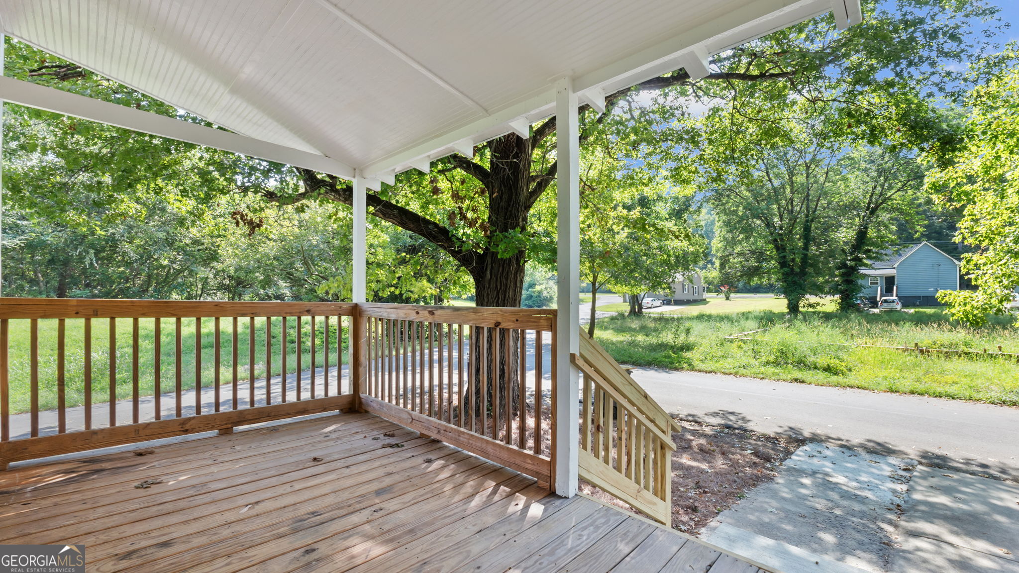 335 South McLin Street Rome, GA 30161 - Photo 18 of 21 a view of balcony with wooden floor
