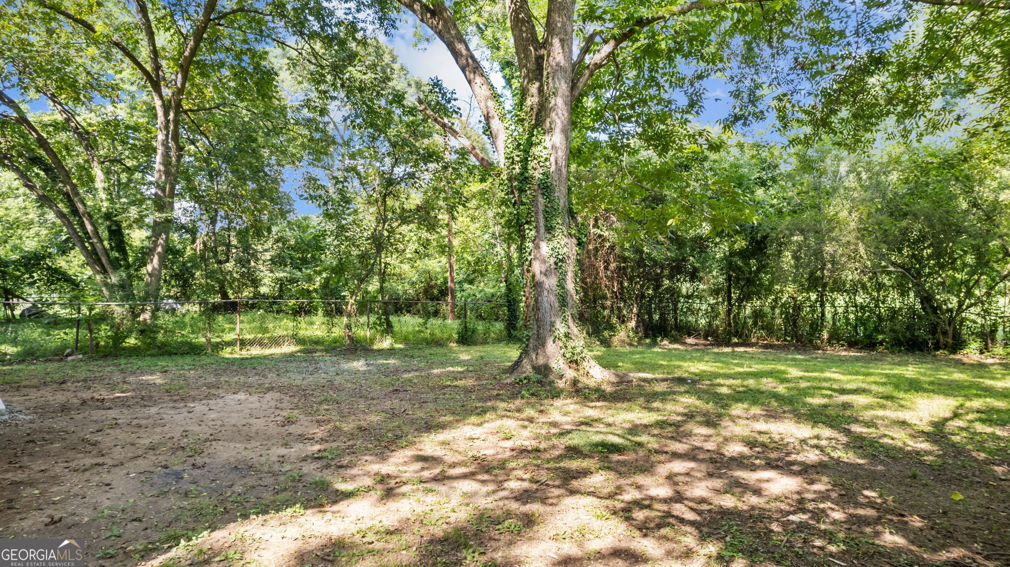 335 South McLin Street Rome, GA 30161 - Photo 19 of 21 a backyard of a house with lots of green space