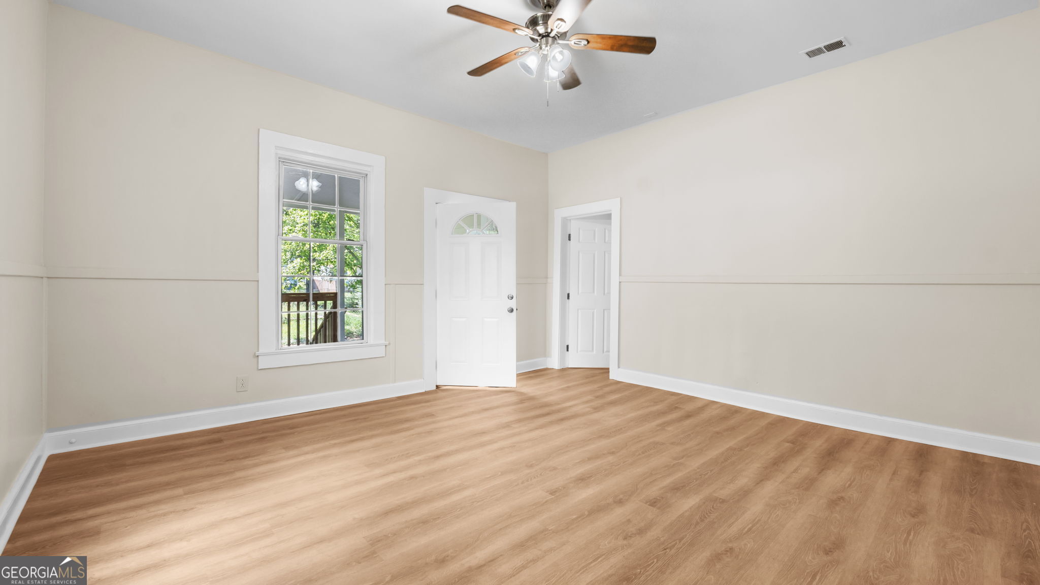 335 South McLin Street Rome, GA 30161 - Photo 5 of 21 a view of an empty room with a window
