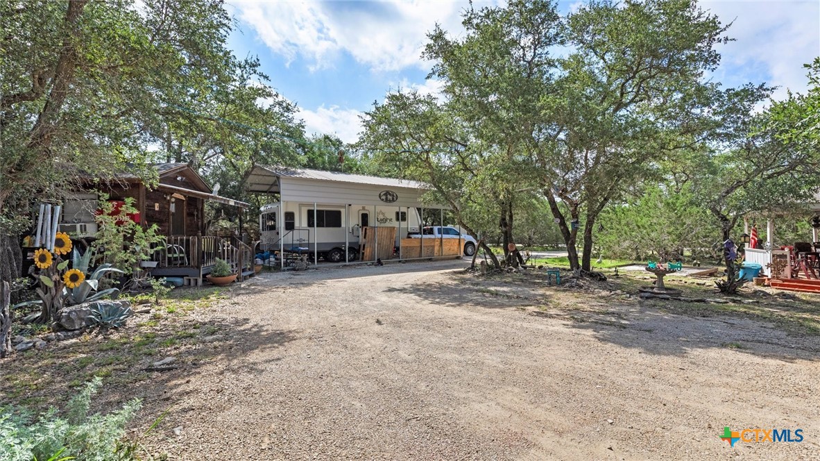 857 Derrick Drive Spring Branch, TX 78070 - Photo 18 of 32 a view of a house with a patio