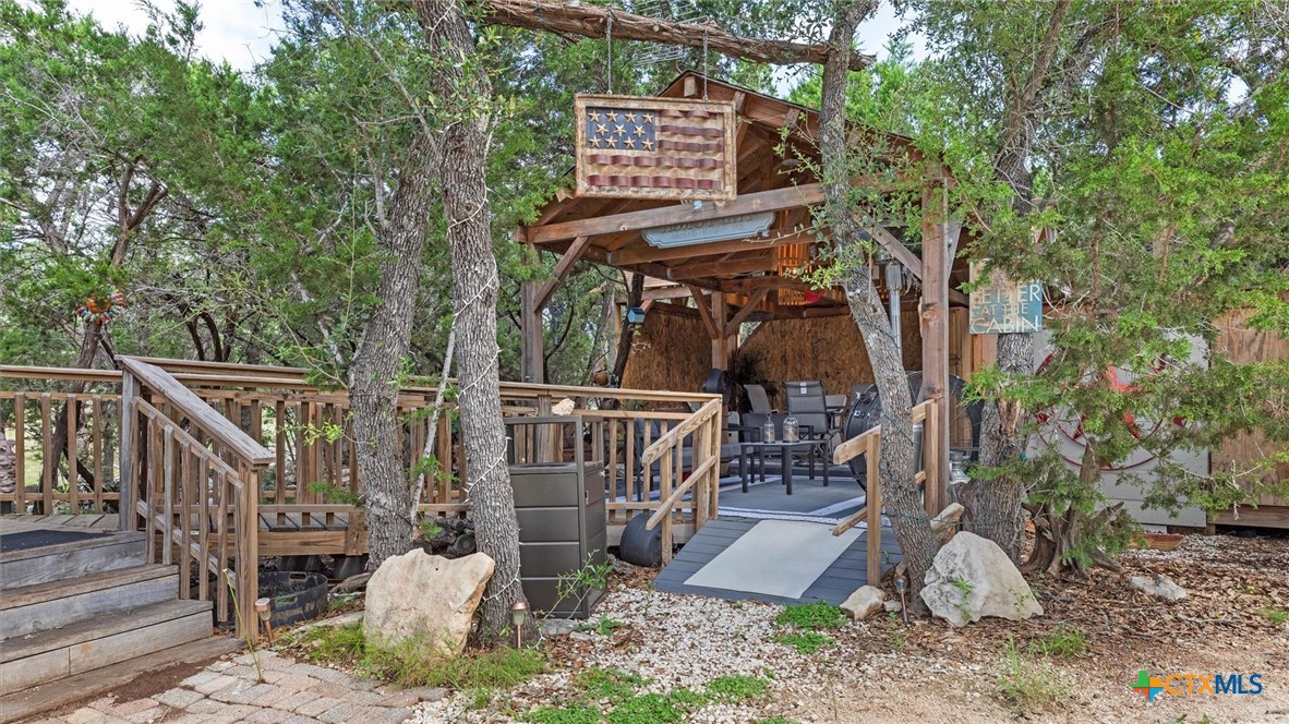857 Derrick Drive Spring Branch, TX 78070 - Photo 22 of 32 a view of outdoor space deck and backyard