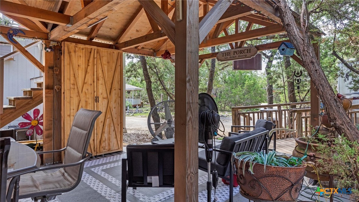 857 Derrick Drive Spring Branch, TX 78070 - Photo 24 of 32 a view of balcony with furniture and wooden deck